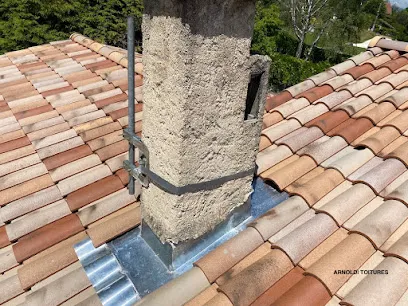 Image de ARNOLDI TOITURES 38 Couvreur Zingueur - Installateur Velux - Isolation des combles - Nettoyage et traitement des tuiles